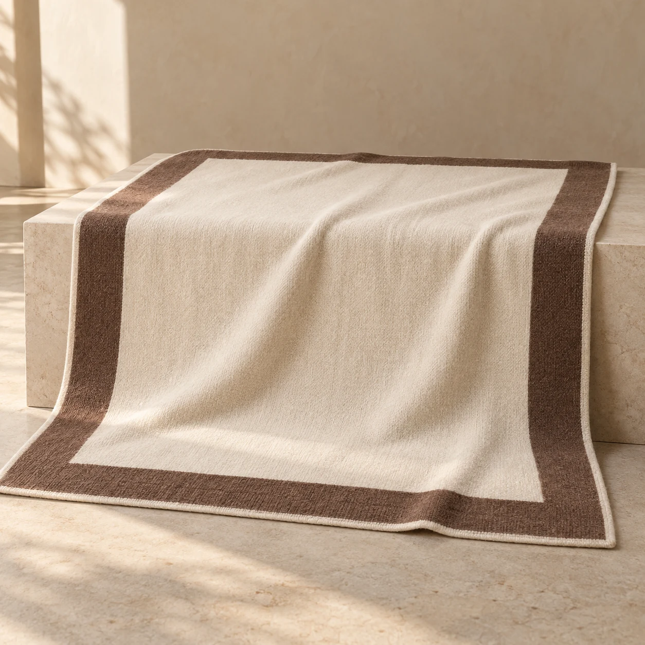 Cocoa Border wool-blend throw — Cream / Cocoa; a cream field framed by a broad cocoa border